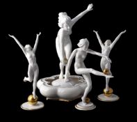 L. HUTSCHENREUTHER, GERMANY, A WHITE CERAMIC AND GILT MODEL OF A GIRL IN ART DECO TASTE