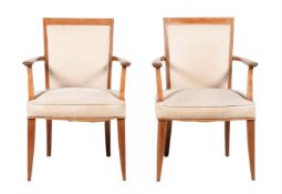 A PAIR OF BEECH OPEN ARMCHAIRS