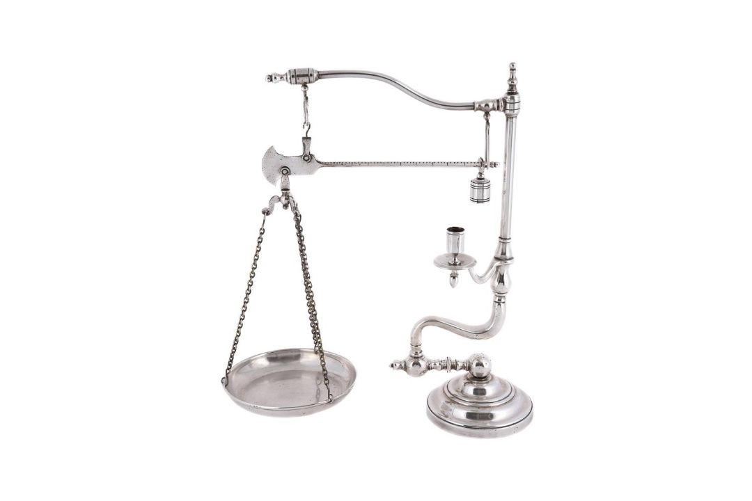 A SILVER PLATED SINGLE PAN WEIGHING SCALE