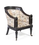 Y AN ANGLO-INDIAN EBONY 'TUB' ARMCHAIR, FIRST HALF 19TH CENTURY
