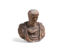 AN ENGLISH CARVED STONE BUST OF THE EMPEROR TRAJAN, 18TH CENTURY