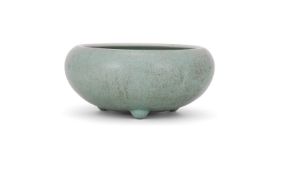 A Chinese celadon crackle-glazed tripod censer