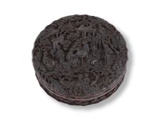 Y A carved Chinese tortoiseshell circular box and cover