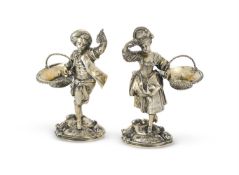 A PAIR OF EDWARDIAN SILVER GILT FIGURAL SALTS