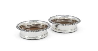 A PAIR OF GEORGE IV SILVER COASTERS