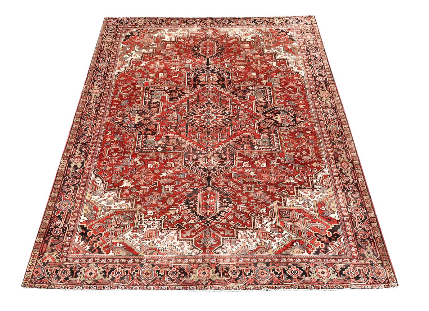 A HERIZ CARPET, approximately 398 x 300cm