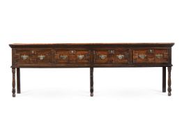 A CHARLES II OAK DRESSER BASE, CIRCA 1670