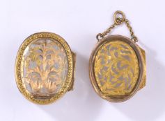 Zwei kleine Bergkristall-Pomander mit Goldmontierung