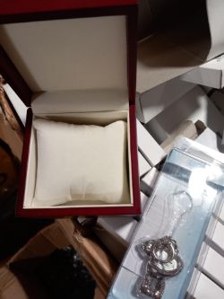 Watch collection key ring and red cushioned box both approx 45 pieces