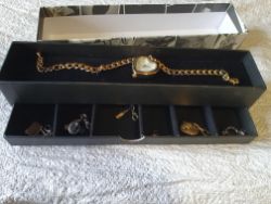 Necklace clocks and attachments approximately 20 box no 225
