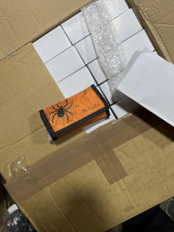 Spider the need wallets with watches inside approx 100 box 473