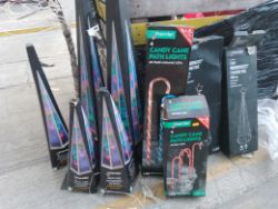 1 Pallet of returned Christmas lights, LED Pyramids, Candy cane Path Lights & more