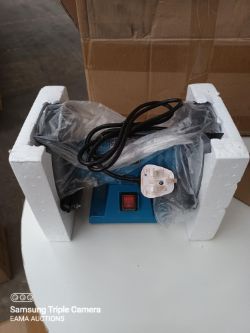 (Box 214) - 1 New bench grinder