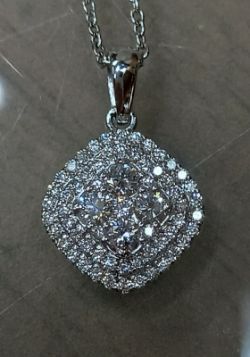 0.56CT DIAMOND PENDANT/14CT WHITE GOLD
