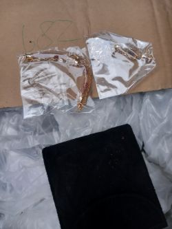 ASSORTED JEWELRY AND BAGS APROX 300