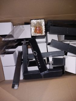 GOLDEN EGGS AND WATCHES APROX 250 PIECES