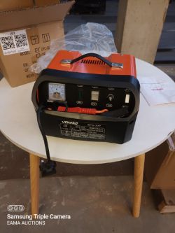BOX 203 CONTAINING CAR BATTERY CHARGER