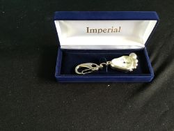 AN IMPIRIAL KEYCHAIN WATCH FOOT