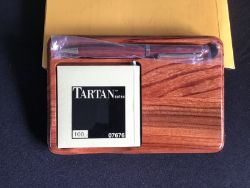 A PEN AND POST IT NOTE SET IN A BE WOODEN DISPLAY CASE