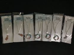 7 X PENDENTS AND CHAINS