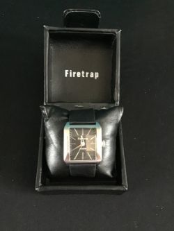 A MAN DESIGNER FIRETRAP WATCH WITH REAL LEATHER STRAP
