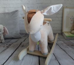 A BRAND NEW BOXED REINDEER ROCKER