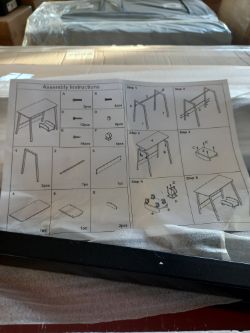 20 WHAT APPEARS TO BE DESKS AND SMALL TROLLEY