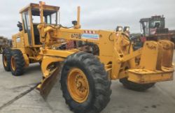JOHN DEERE 670 MOTOR GRADER ( SAME SIZE AS CAT 140