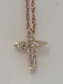 0.30CT DIAMOND CROSS WITH 16