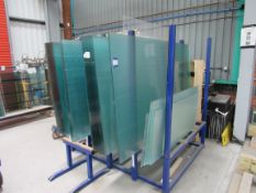 Adjustable glass rack and quantity of assorted gla