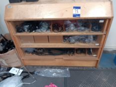 Timber three tier display chest and contents to include various electrical bike spares, throttles,