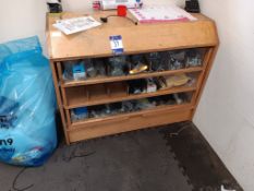 Timber three tier display chest and contents to include various bicycle consumables, spokes, nuts