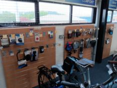 Stock contents to 4 racks to include locks, lights, saddles, pumps and oils & lubricants (excludes