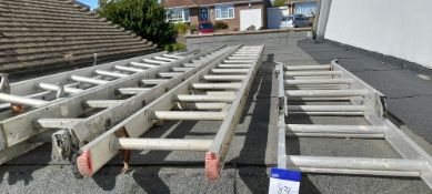 Quantity of various ladders of different sizes to roof