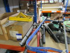 Quantity of bolt croppers, riveters, and measuring wheels to shelf