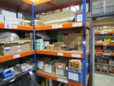 Large quantity of electrical components to rack including rack