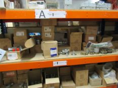 Quantity of various electrical components to rack including rack