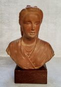 An early 20th century Danish terracotta bust of a young Alexandra of Denmark,  Empress Consort of
