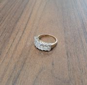 A 14ct gold cluster ring set with 14 pear shaped good quality CZ's, size T, 5.7g gross