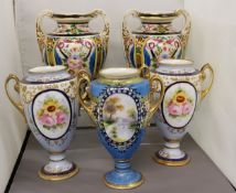 A pair of Noritake two handled ovoid vases, decorated with stylised flowers and scrolls, 21cm