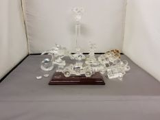 Swarovski - a dolphin;  candlestick;  train;  other glassware similar, Mickey and Minnie Mouse;
