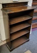An oak floor standing open book case, 124cm high,  76.5cm wide,  28cm deep, c.1940