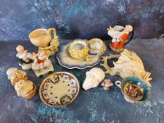 A mid 20th century Continental novelty cruet set, as two chicks in a nest;   a novelty milk jug,