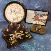 An early 20th century standish, clear glass square well, hinged brass cover, the stand embossed with