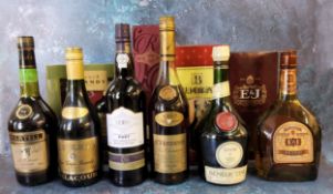 A bottle of Hennessy fine champagne VSOP cagnac; Martell cognac; E&J brandy; Napoleon pure grape