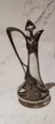 A W.M.F. liqueur decanter, applied with sinuous lines and foliage, 25cm high, c.1910