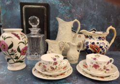 A Waterford crystal decanter, boxed;  Portmeirion British Heritage Collection jugs;  The Botanical