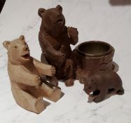 An early 20th century Black Forest bear, he stands by a tree stump, 13cm high, c.1900;  others (3)