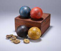 A SET OF FOUR CROQUET BALLS, LATE VICTORIAN / EDWARDIAN