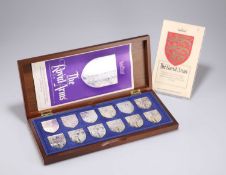 ROYAL INTEREST: A SET OF TWELVE ELIZABETH II SILVER INGOTS, 